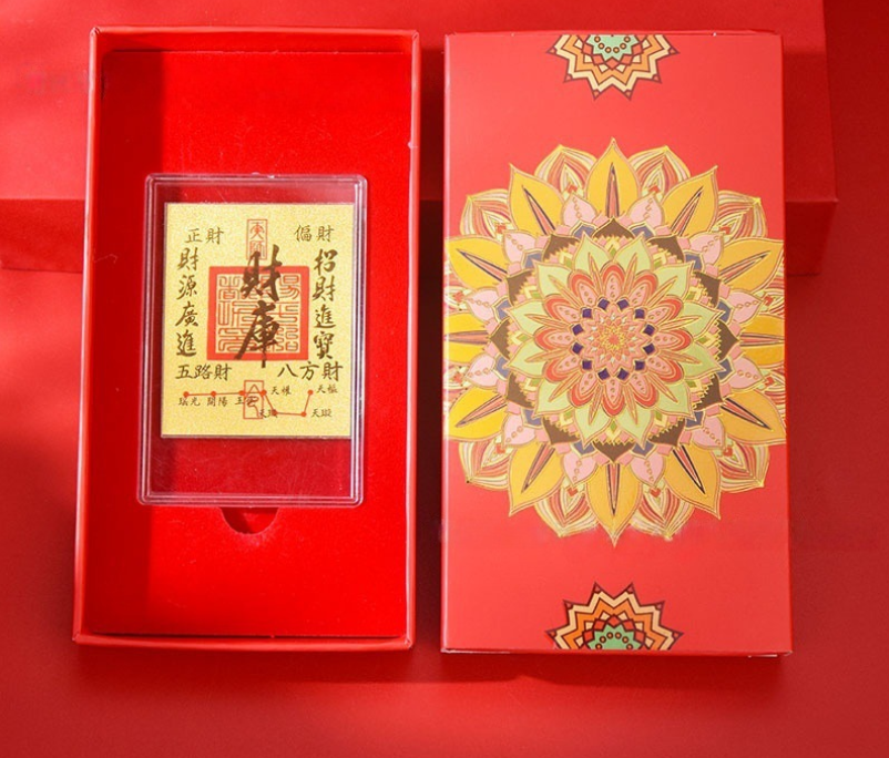 Gold-toned Cai Ku Wealth Talisman card for financial prosperity