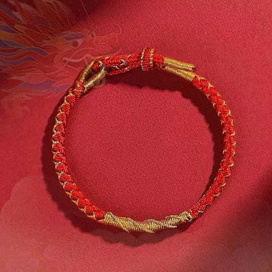 Red string bracelet packaged as a romantic gift for couples seeking marriage and love luck